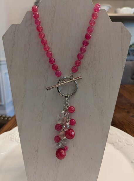 Beaded pink jade necklace with a stone cluster pendant